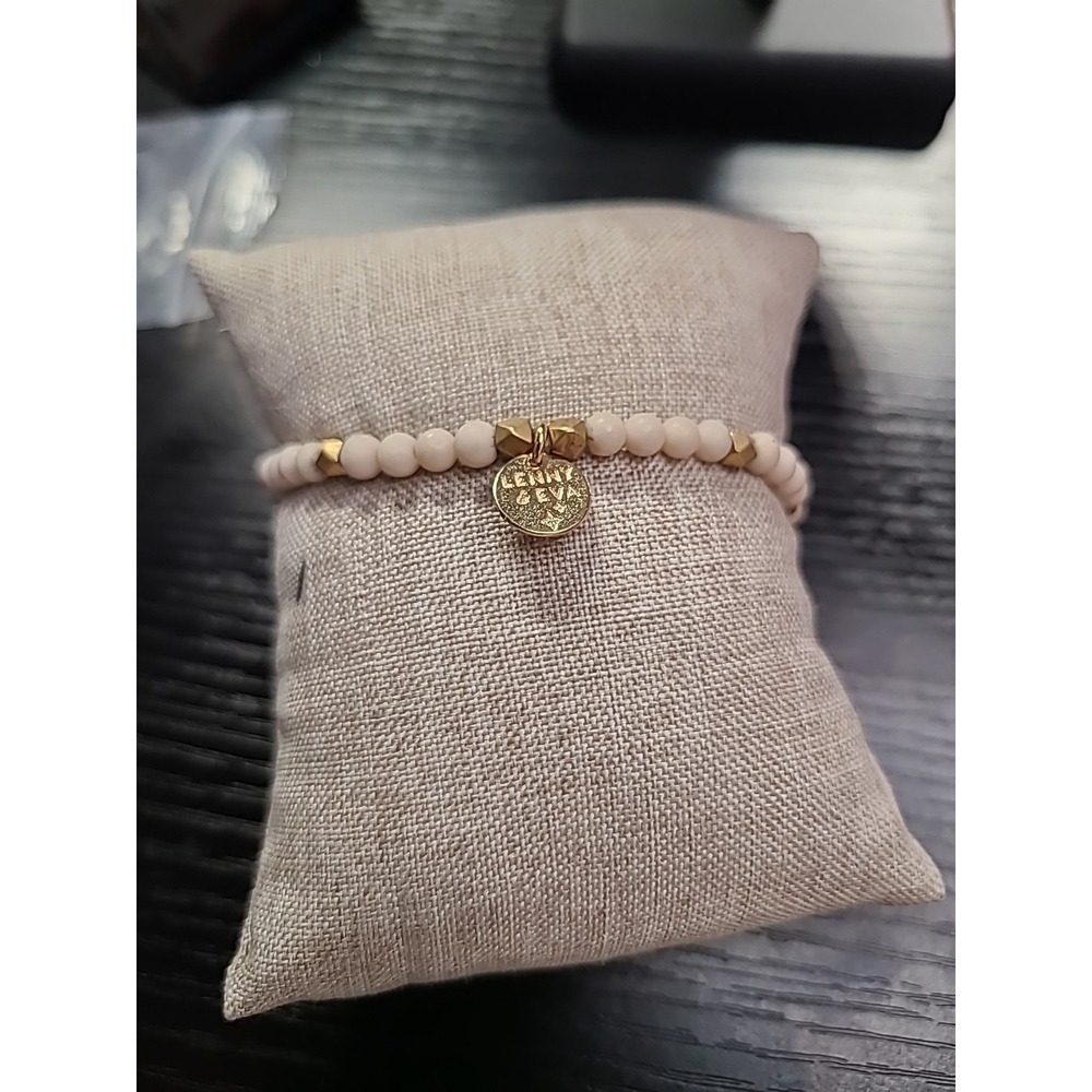 Lenny & Eva Cream Bead Stretch Bracelet Gold Spacer Logo Charm Stackable